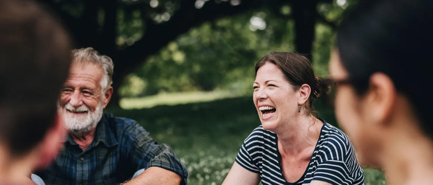 Group of adults laughing together